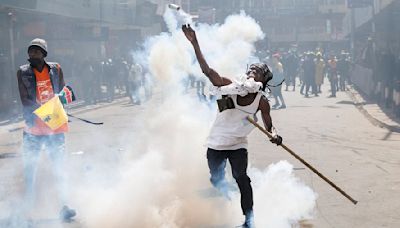 Fire erupts at Kenyan parliament during deadly riots over tax hikes