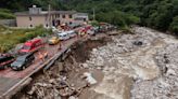 China evacuates residents and searches for mudslide victims as storms lash parts of the country