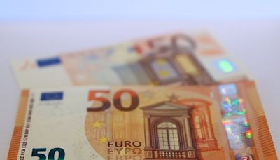 Euro holds firm after ECB leaves options open for Sept cut