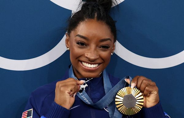 The Meaning Behind Simone Biles’s Sparkly Goat Necklace Is Iconic