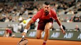 Djokovic uneven in first-round win at French Open
