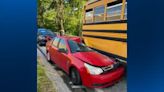 Car ends up under school bus after crash in West Mifflin