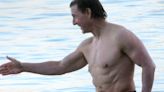 Tom Cruise, 61, shows off his shirtless physique for a dip in Majorca