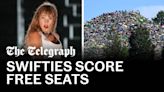 Watch: Thousands of Taylor Swift fans get free seats by perching on grassy hill