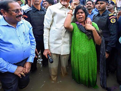 Naidu Uses A JCB To Meet Flood Affected