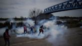 French protests drag on after Macron's pension plan push