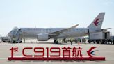 China's 1st domestically made passenger plane completes maiden commercial flight