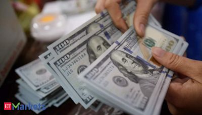 Dollar firm on Powell caution, kiwi bides time before rates decision - The Economic Times