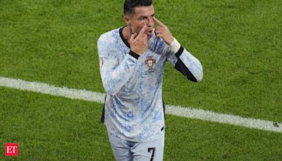 Watch horrifying video: After shocking Portugal- Georgia defeat, Christiano Ronaldo escapes injury by whiskers as fan jumps.