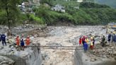 China floods kills at least 25 as rescuers look for dozens missing