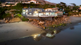 Elvis filmed at this renovated beach house on rocky outcropping in Malibu