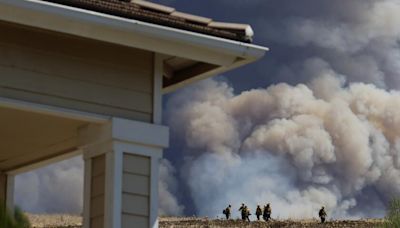 SoCal monster fires explode: Homes burn, 13 hurt, communities threatened