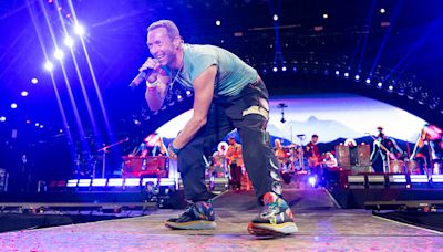 Michael J Fox plays guitar with Coldplay during emotional Glastonbury performance