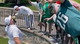 Jason Kelce Shotguns Beers with Hecklers at His Charity Golf Tournament