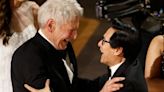 Ke Huy Quan goes adorably wild over Indiana Jones costar Harrison Ford at 2023 Oscars
