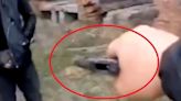 'War hero' in Russia threatens to shoot civilian over pacifist badge - Video