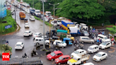 Traffic crawls at pot-holed Nanthoor Jn on NH 66 | Bengaluru News - Times of India