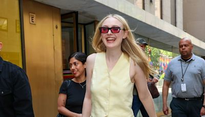 Dakota Fanning Pairs a Buttery Suit Set With a Coded Luxury Status Symbol