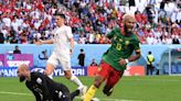 Cameroon score two quick-fire goals to claim point in thriller against Serbia