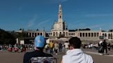 Faithful descend on Portugal’s Fatima to pray for peace as wars rage