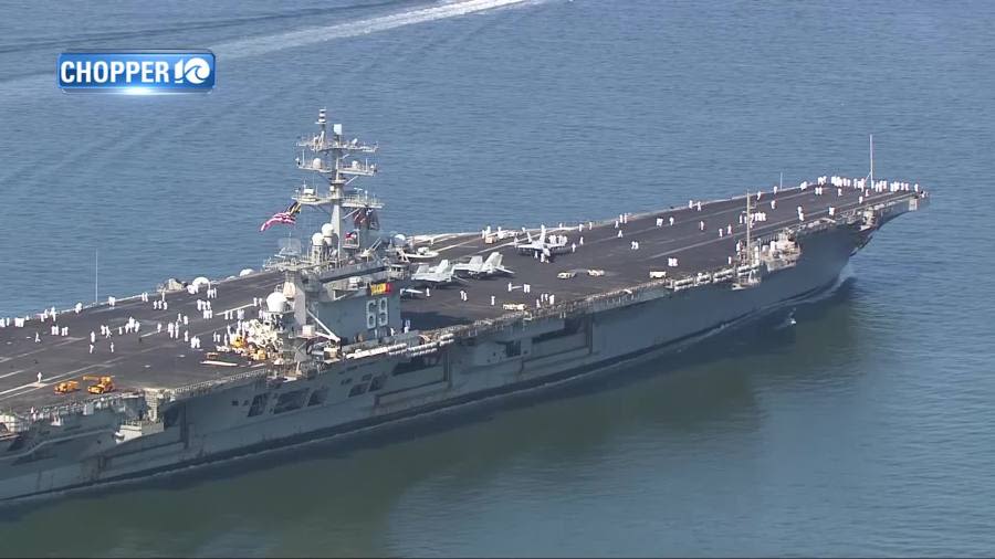 Chopper 10 flies over USS Dwight D. Eisenhower’s homecoming