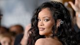 Rihanna's freshly coloured icy blonde updo is giving us Pam Anderson vibes