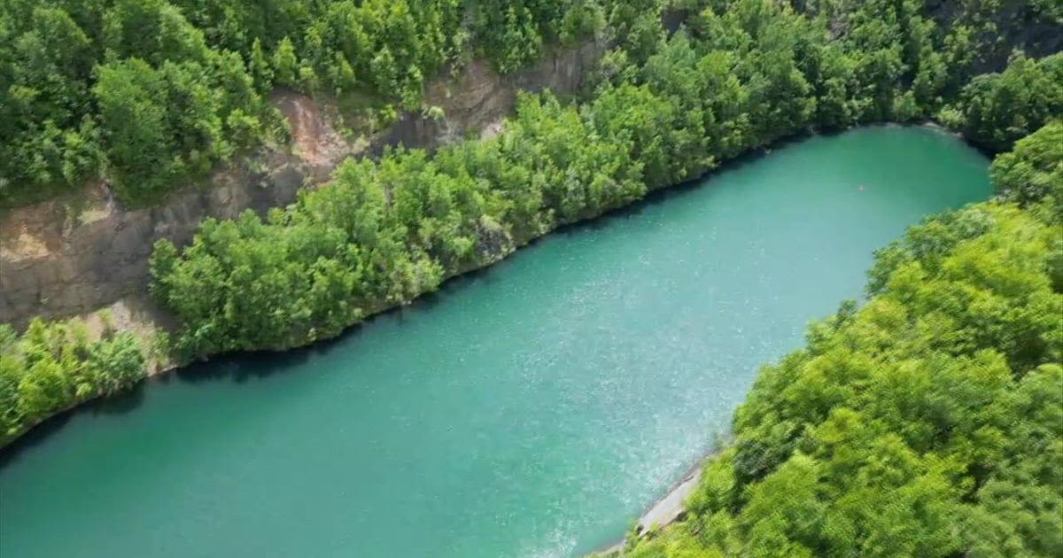 Search for missing kayaker continues in strip-mining pit which can reach 1,000 feet deep in places