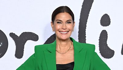 Teri Hatcher, 59, hits the beach in lace-up swimsuit while 'falling in love'