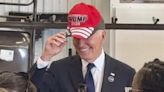 Joe Biden wears Trump MAGA hat as he's called 'old fart' by supporter