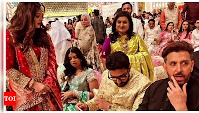After arriving separately at Anant Ambani-Radhika Merchant's wedding, Aishwarya Rai, Abhishek Bachchan and Aaradhya were seen sitting together - See viral photos | - Times of India