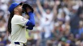 Luis Castillo steps in as a batter after injury forces Mariners to give up the designated hitter