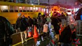 NYC decision to move migrants from tent shelter to a school amid storm draws fire