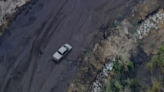 Drivers trapped as mudslides and flash floods hit southern California