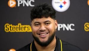 Troy Fautanu describes emotions leading up to draft call