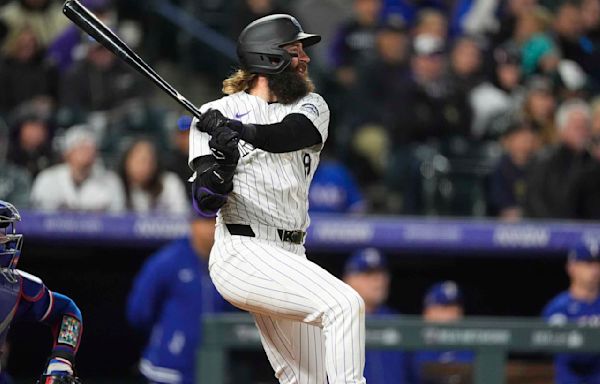 Charlie Blackmon's 2-run double in the 8th inning leads Rockies past Rangers 4-2