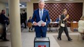 Lithuanians return to the polls with incumbent president favored to win 2nd election round