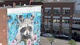 Huge raccoon mural on South Side promotes wildlife advocacy
