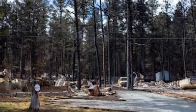 Team combs fire-ravaged New Mexico community for remains of the missing