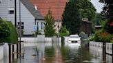 Germany counts flooding losses as heavy rains stoke climate debate