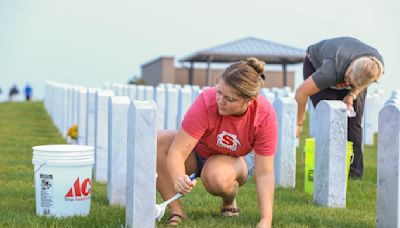 Volunteers 'Carry the Load' at Fargo National Cemetery in honor of 9/11