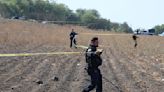 Police searching for clandestine crematorium in Mexico say bones found around charred pit are of "animal origin"