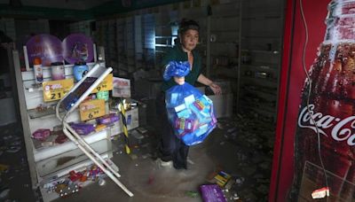 Merchants in Brazil's flood-hit south try to save stock as forecast to worsen