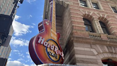 My partner and I went to Hard Rock Cafe for the first time. The decor is cool, but our $80 meal wasn't worth it.