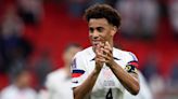 ...Tyler Adams brings infant son Jax onto pitch to soak in CONCACAF Nations League victory celebrations - but he's not impressed by Christian Pulisic's winners medal! | Goal.com Tanzania