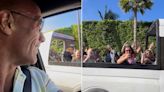 Dwayne Johnson Surprises L.A. Celebrity Tour Bus as It Stops Beside His Car: ‘I’m Like a Big Kid’