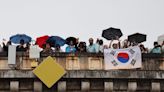Paris-2024: COI pede 'profundas desculpas' por confundir Coreias durante cerimônia de abertura