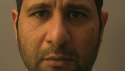 Van driver who smuggled migrants found screaming for help jailed for 10 years