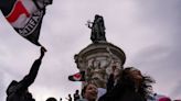 French protesters set off fireworks and damage Paris storefront after far-right election result