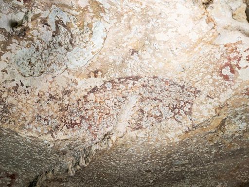 World’s oldest cave painting in Indonesia shows a pig and people