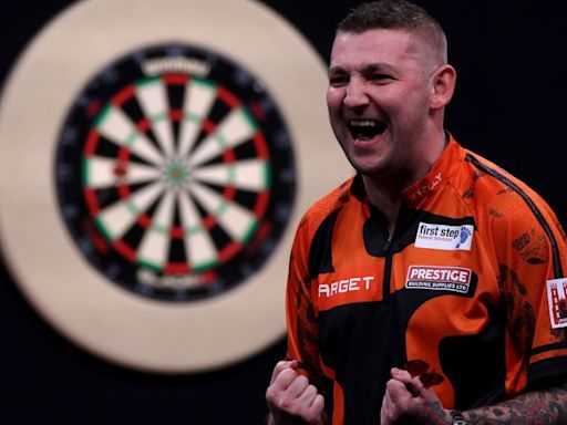 Premier League Darts: Nathan Aspinall beats Michael Smith to win night 12 in Rotterdam